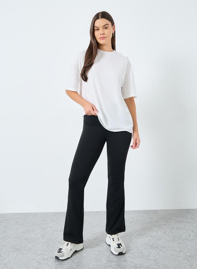 Black Flared Leggings – Wide Fit Mid-Rise Essential - Image 1