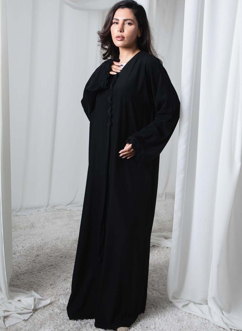Timeless Black Nida Abaya with Elegant Trim Detail - Image 1