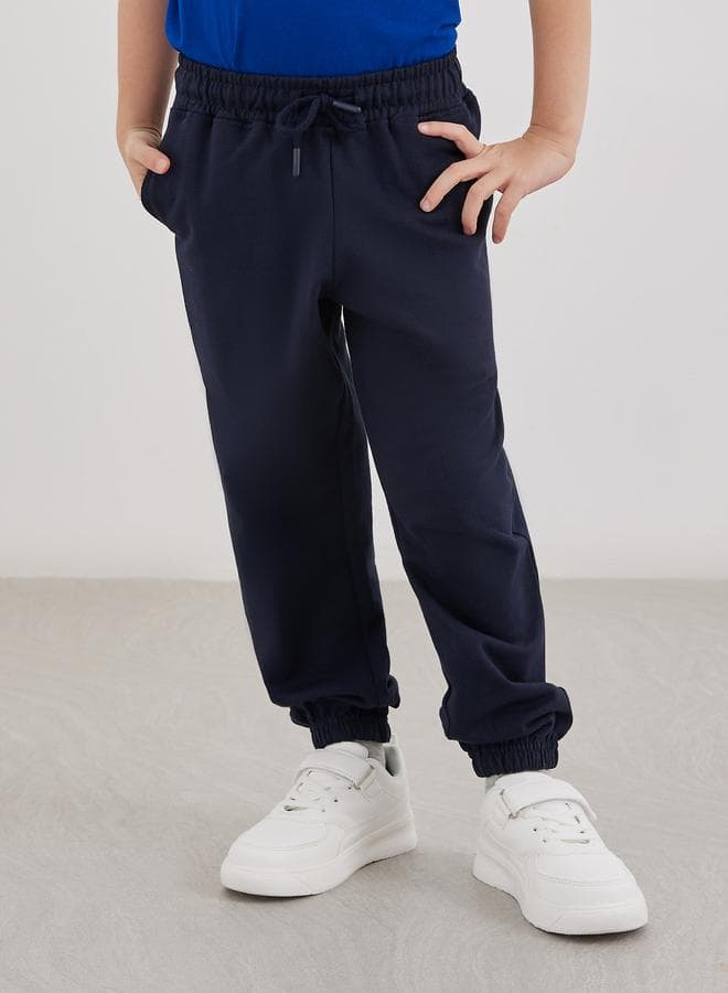 Styli Navy Blue Cotton Joggers with Cuffed Hem - Image 1