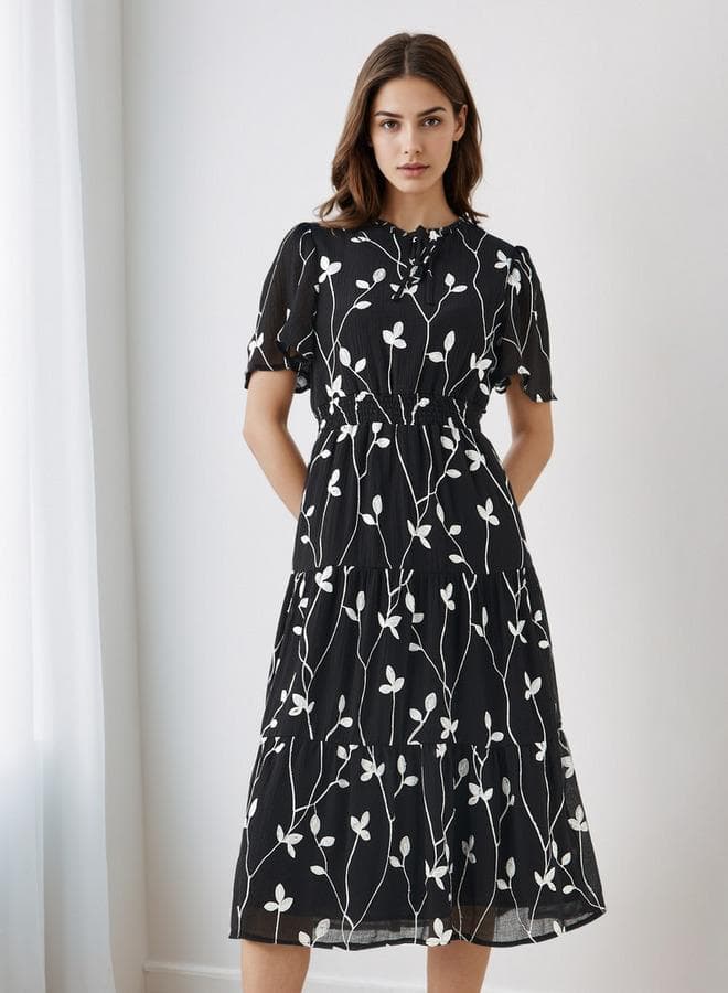 Black Floral Embroidered Tiered Midi Dress with Flutter Sleeves - Image 1