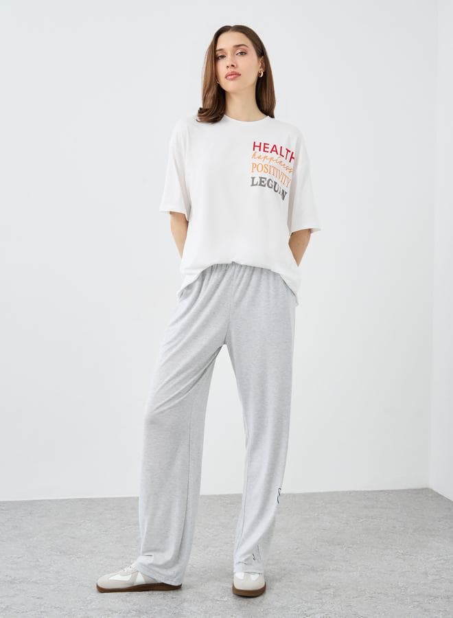 Oversized Slogan Print White T-Shirt for Women - Image 1