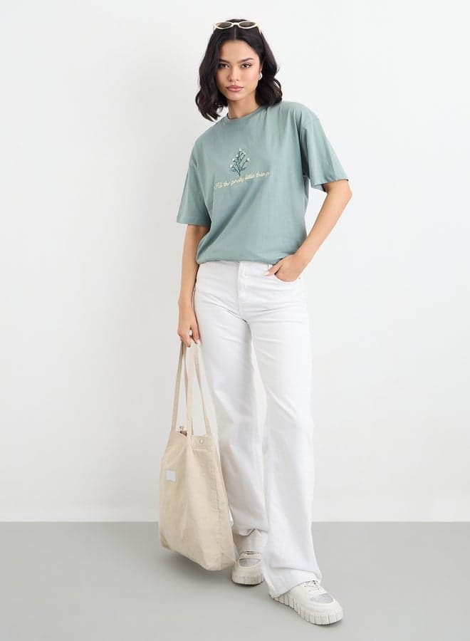 Styli Embroidered Slogan Oversized Cotton T-Shirt Green - Image 1
