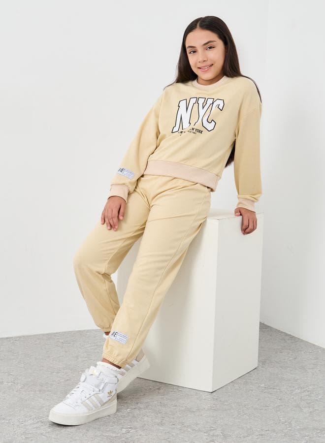 Styli Teen Beige NYC Print Sweatshirt Jogger Set - Image 1
