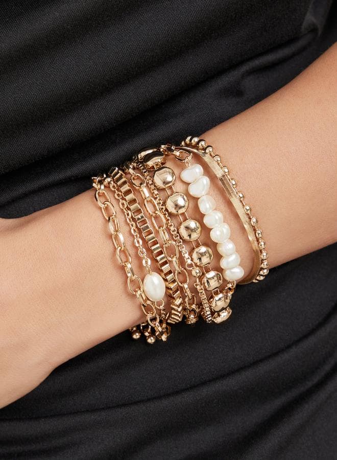 Styli Set of 8 Gold Tone Layered Bracelets - Image 1