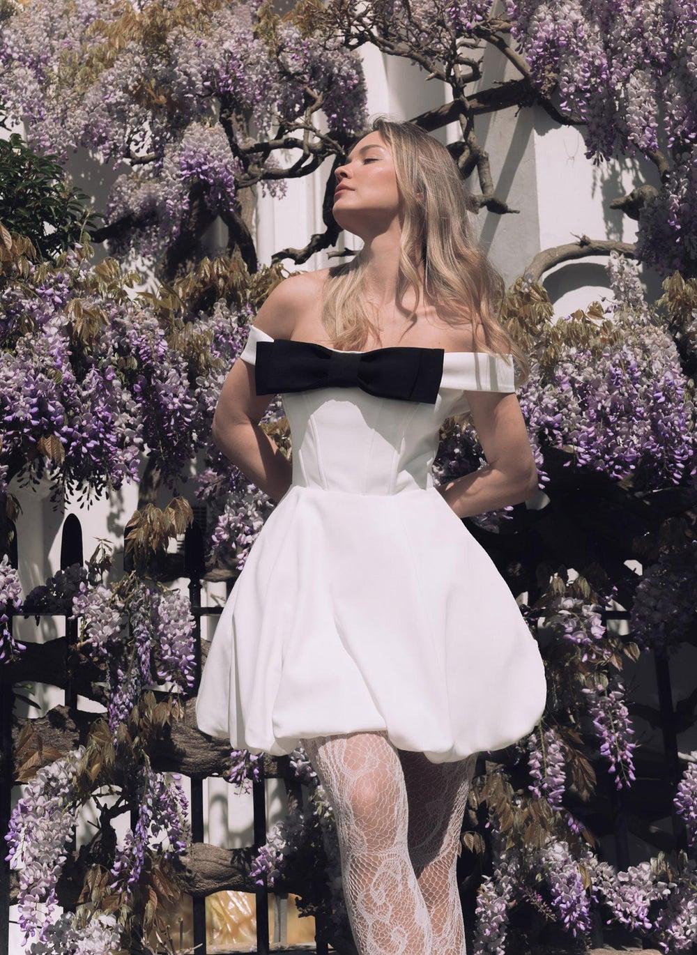 White Floral Mini Dress with Open Shoulders & Bow - Image 1