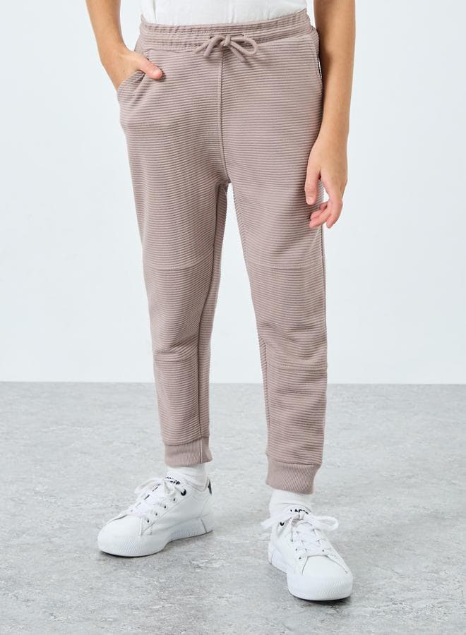Styli Boys Beige Textured Ottoman Joggers - Image 1