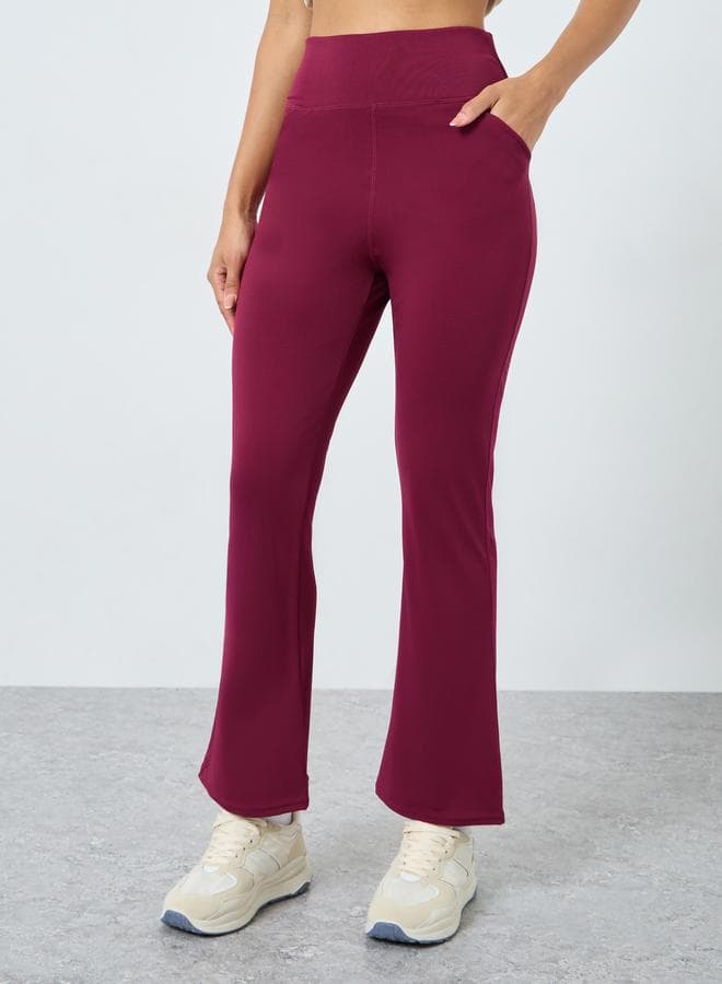 Burgundy Flared Leggings with Side & Back Pockets - Image 1