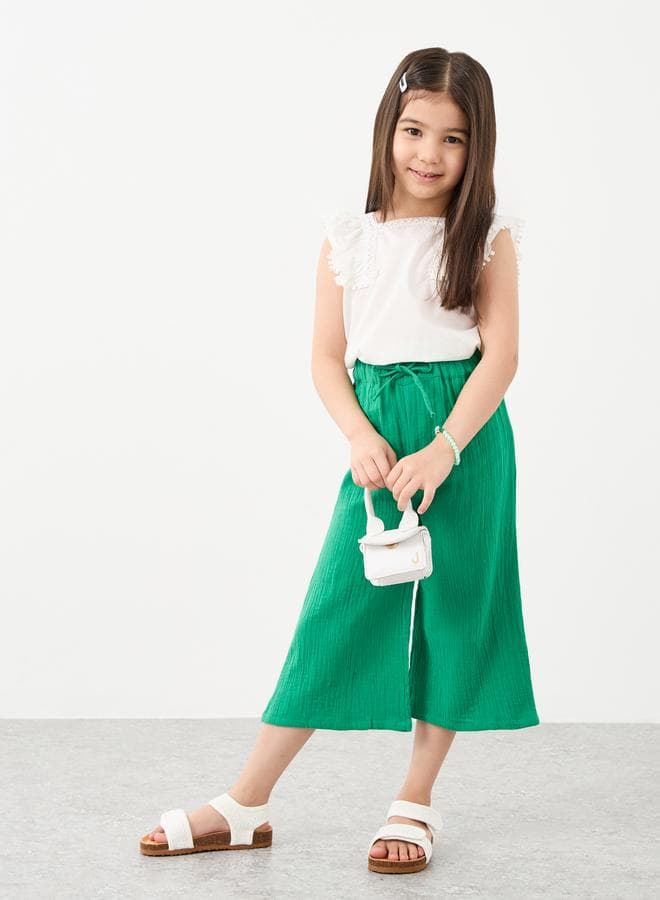 Styli Textured Wide Leg Drawstring Pants - Image 1