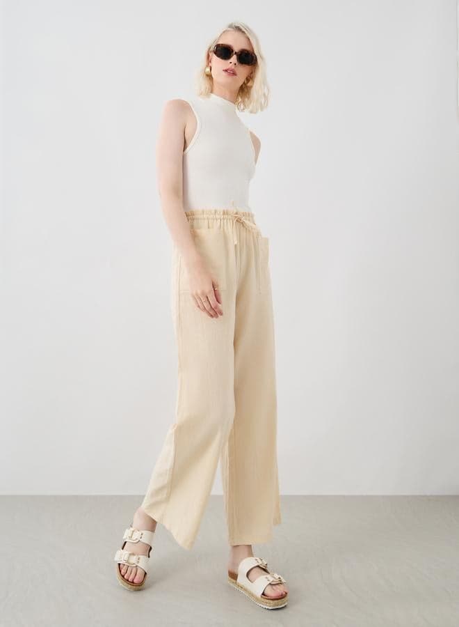 Beige High-Rise Wide Leg Pants with Drawstring Pockets - Image 1