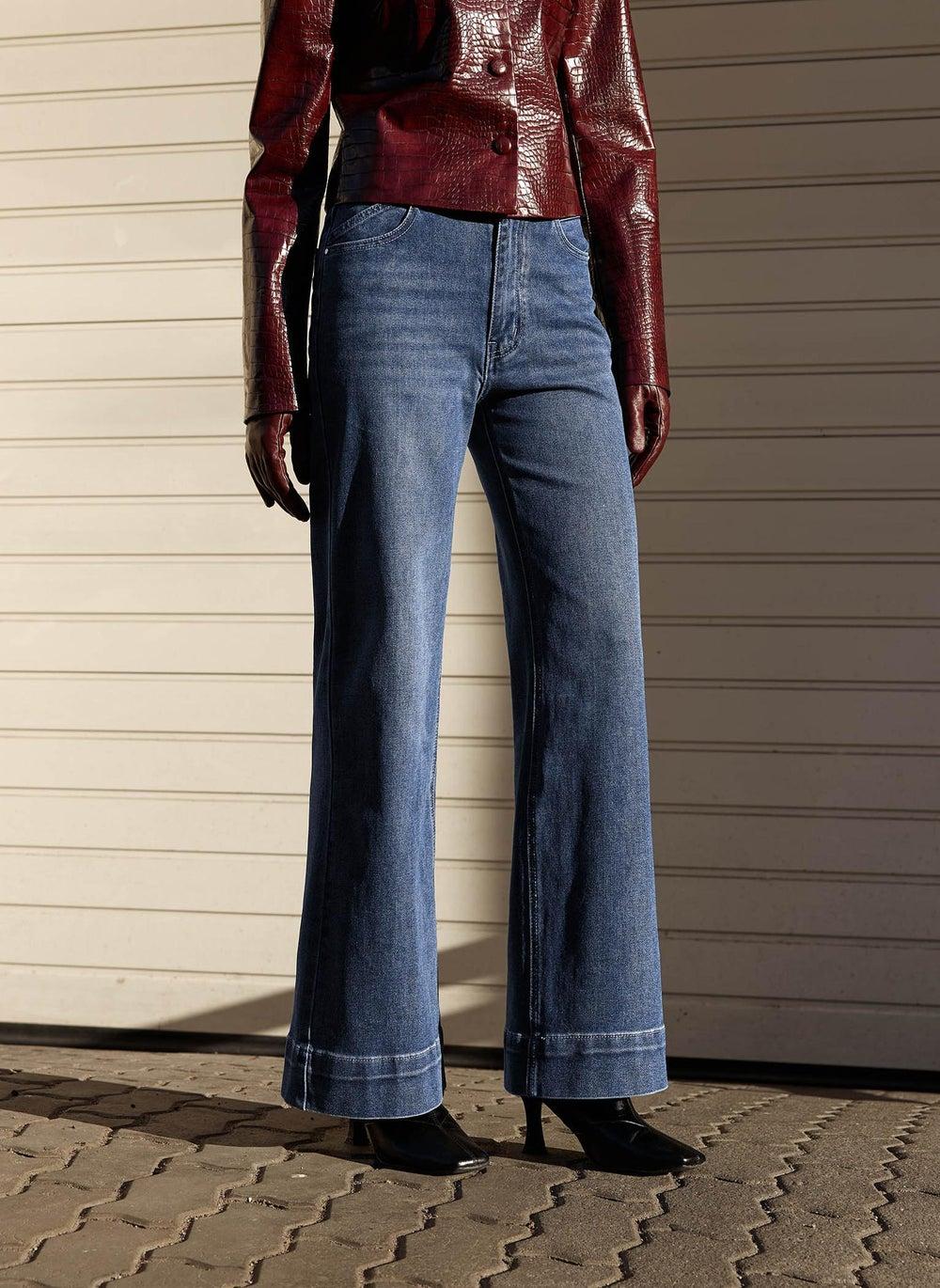 High-Waist Flared Denim Jeans with Distressed Scuffs - Image 1