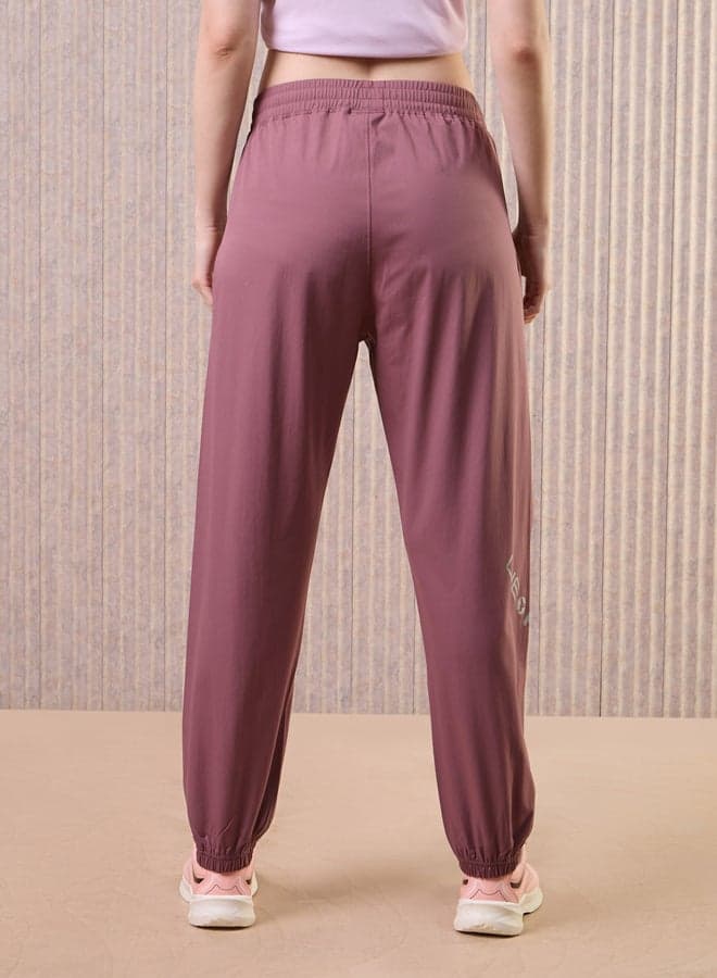 Women’s Solid 2-Way Stretch Performance Joggers - Image 1