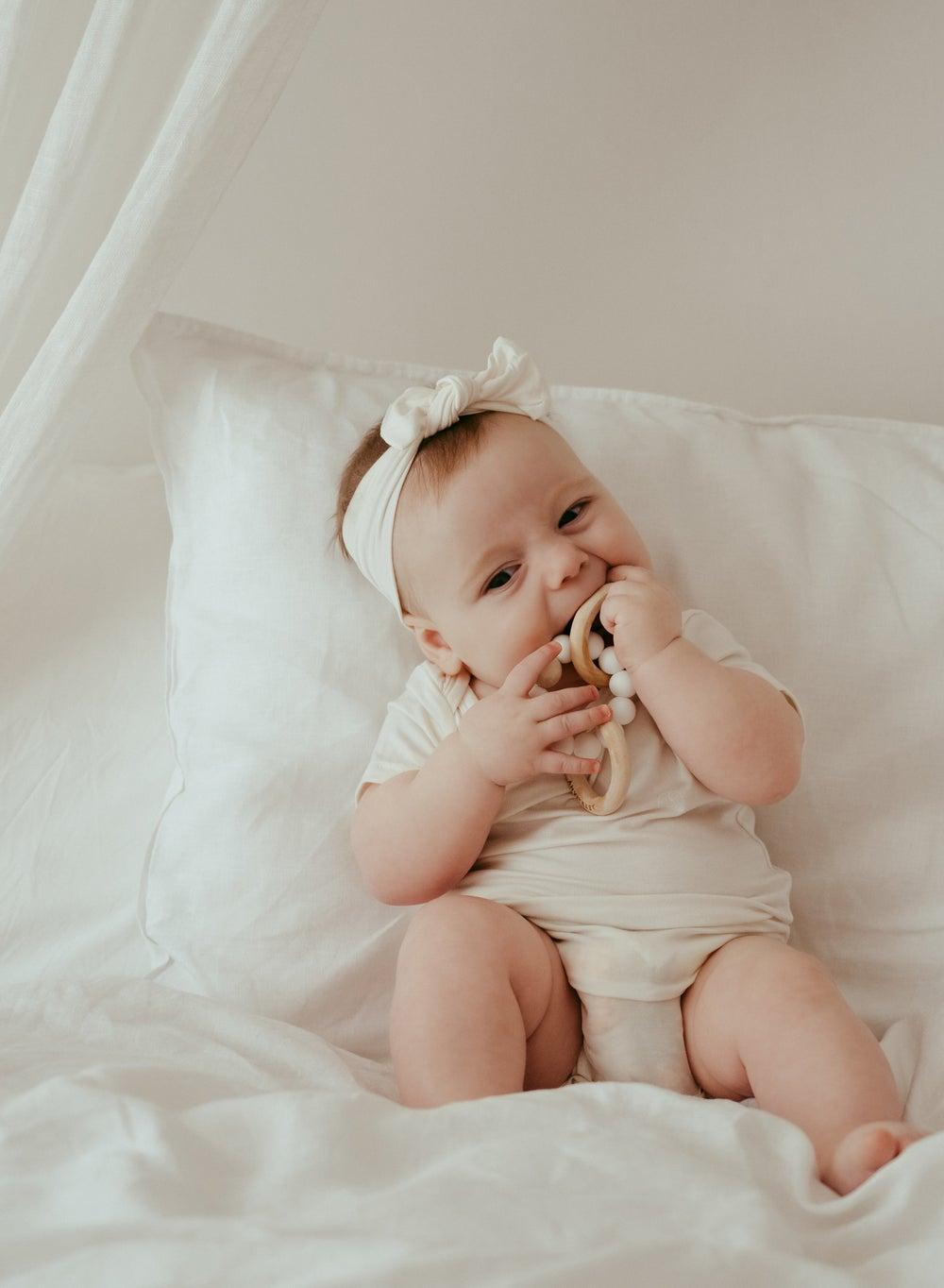 Organic Bamboo Spandex Bodysuit- White Preemie to 3kg - Image 1
