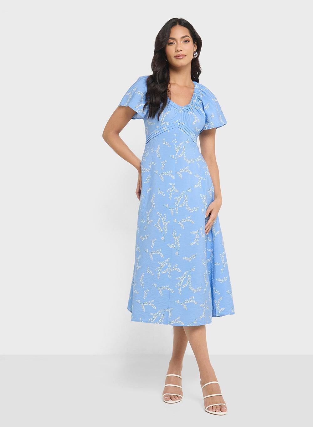 Light Blue Floral Print Midi Dress with V-Neck - Image 1