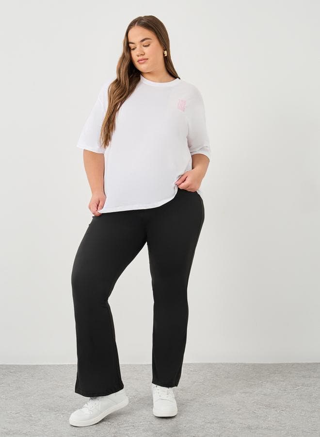 Plus Flared Leggings with Sculpting Elastic Waist - Image 1