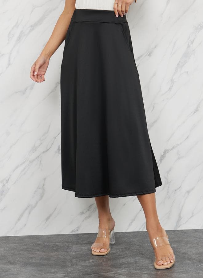 Elegant A-Line Midi Skirt with Elastic Waist & Pockets - Image 1