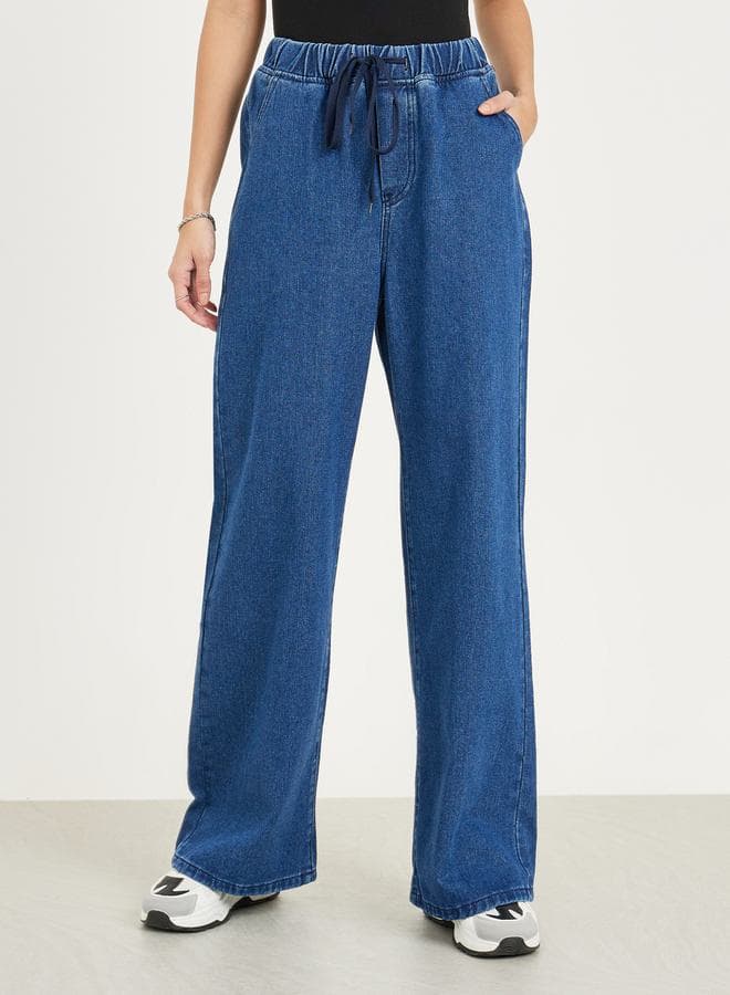 Relaxed Wide Leg Drawstring Jeans with Utility Pockets - Image 1