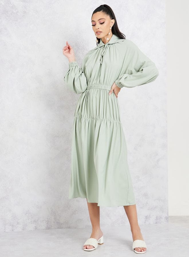 Styli Sage Tiered Midi Dress with Tie-Up Collar - Image 1