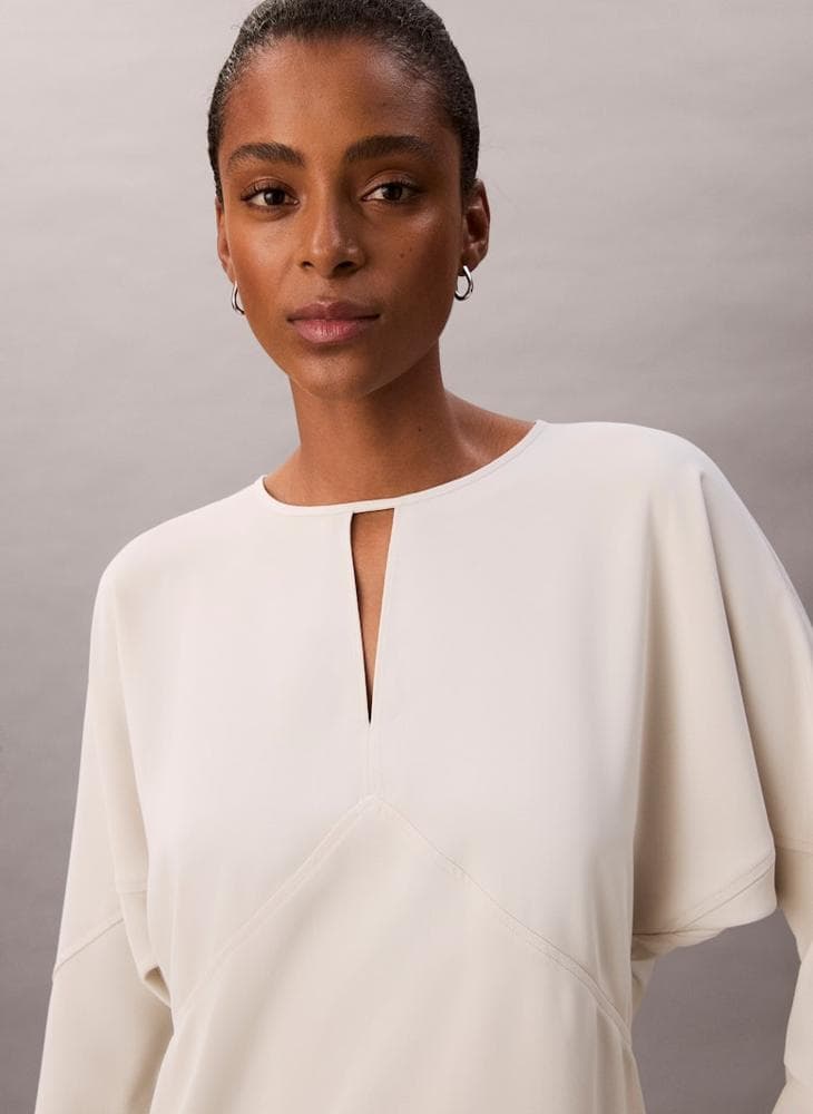 Casual V-Neck Blouse with Sleeve Paneling - Image 1