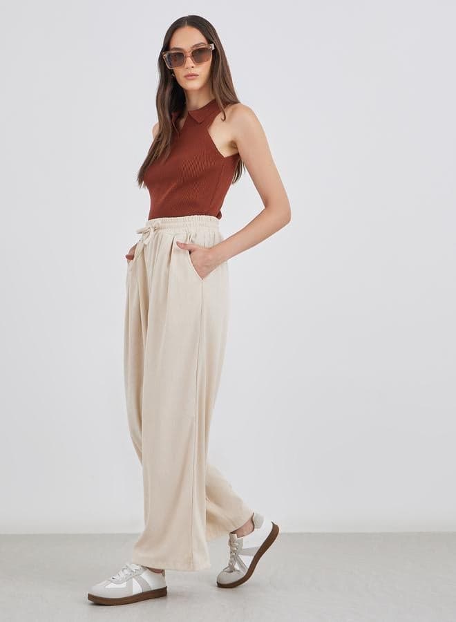 Cream Corduroy Wide Leg Trousers for Women - Image 1