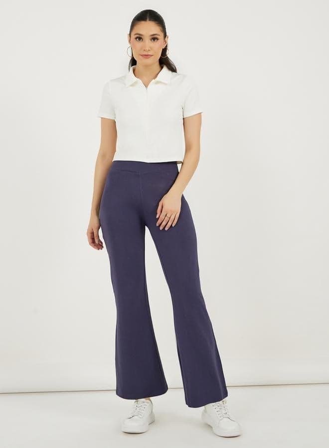 Styli Solid Criss-Cross Waistband Fit and Flare Leggings - Image 1
