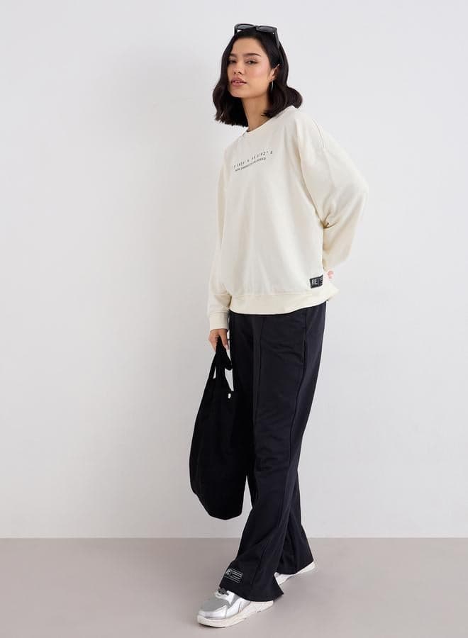 Styli Women Printed Sweatshirt & Wide Joggers Co-Ord Set - Image 1
