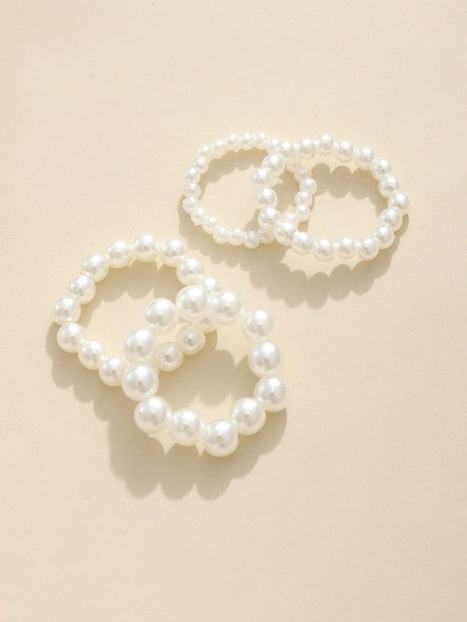 Take Two Set of 4 Faux Pearl Rings - Image 1
