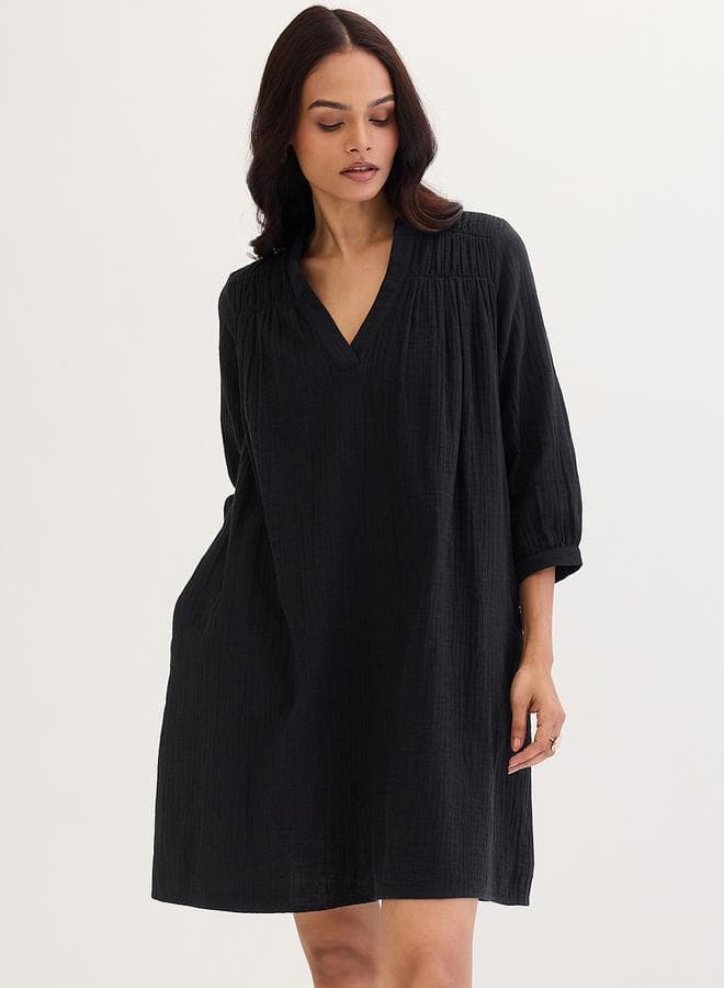 Femmella Black Textured Cotton Mini Shift Dress - Image 1