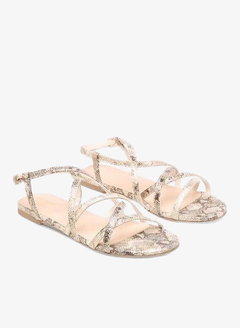 Women Solid Criss-Cross Flat Sandals with Buckle Closure - Image 1