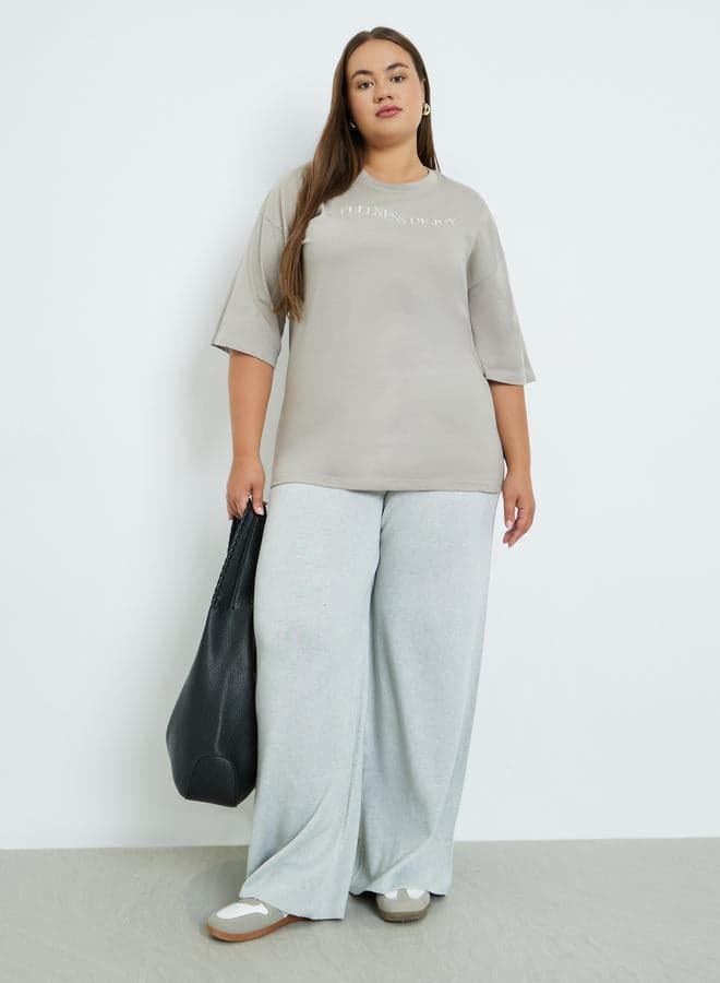 Plus Size Grey Flared Trousers - Image 1