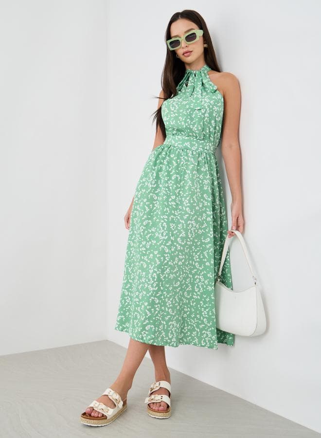 Light Green Floral Sleeveless Midi Dress with Tie-Up Neck - Image 1