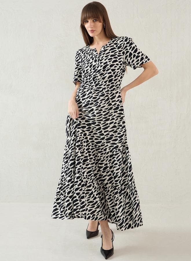 Femmella Abstract Print Tiered Short Sleeve Maxi Dress - Image 1