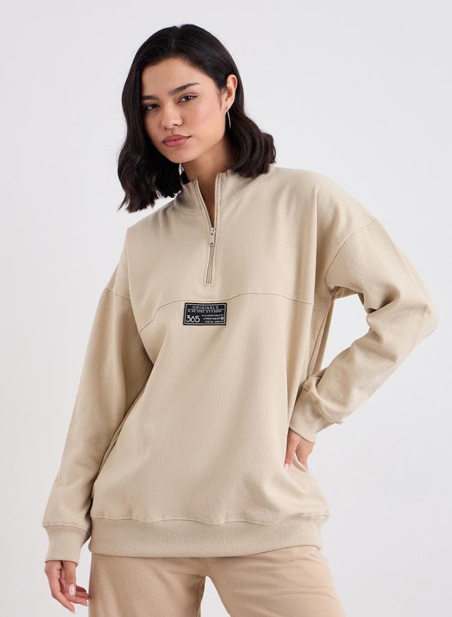 Styli Beige Longline Sweatshirt with Badge Detail - Image 1