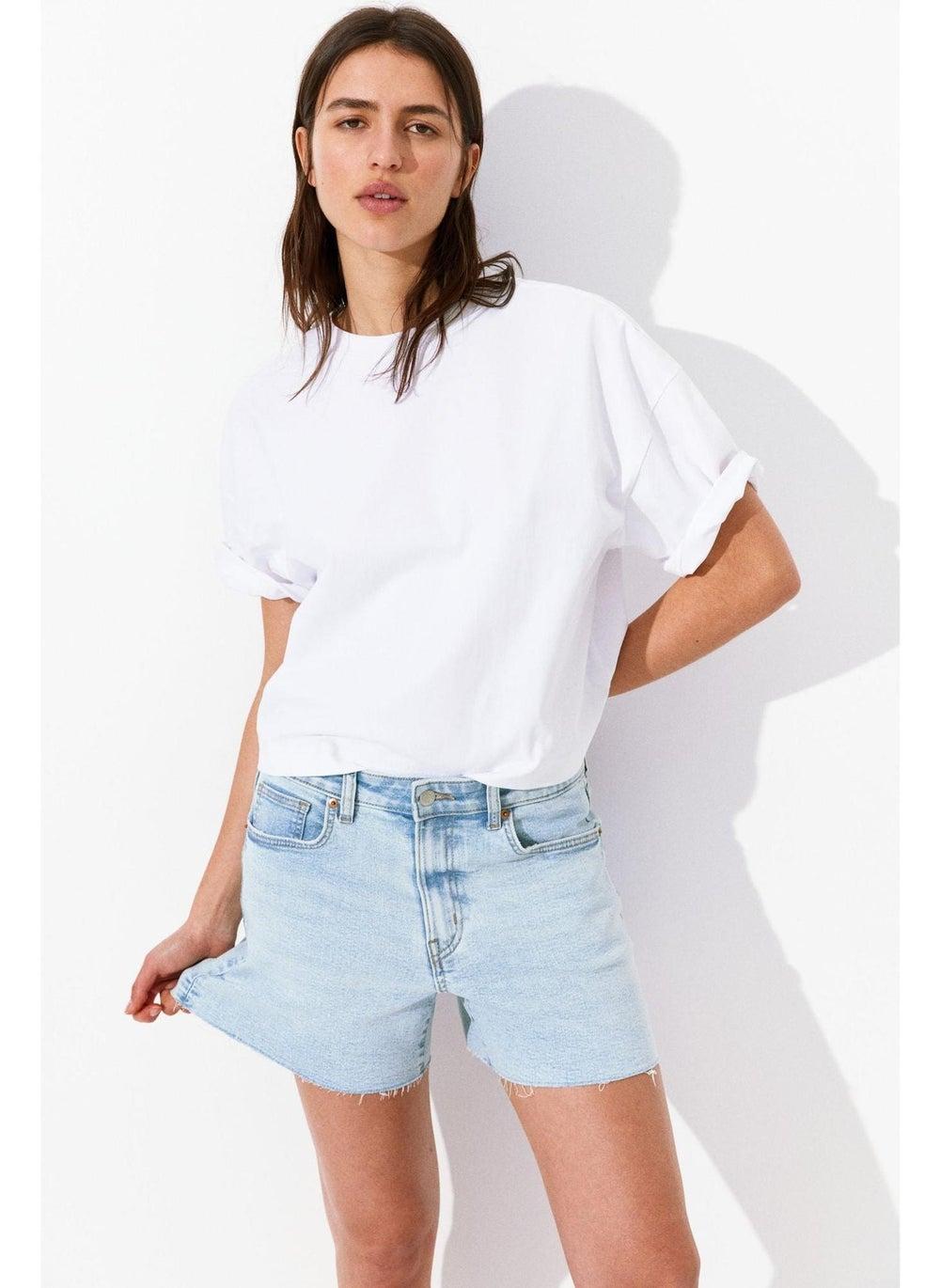 High-Waist Skinny Denim Shorts with Raw Hems - Image 1