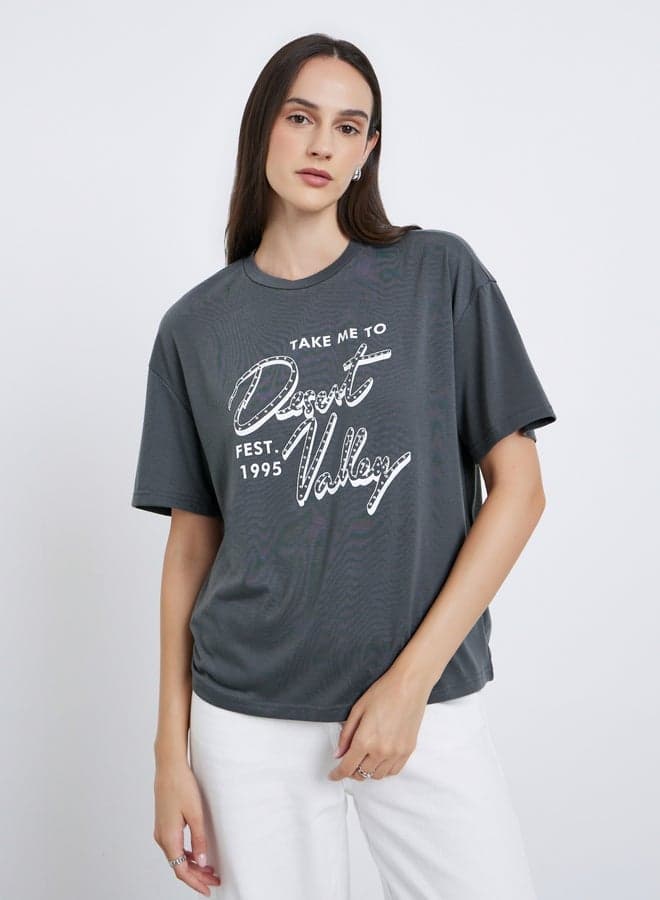 Styli Women Charcoal Oversized Graphic Print T-Shirt - Image 1