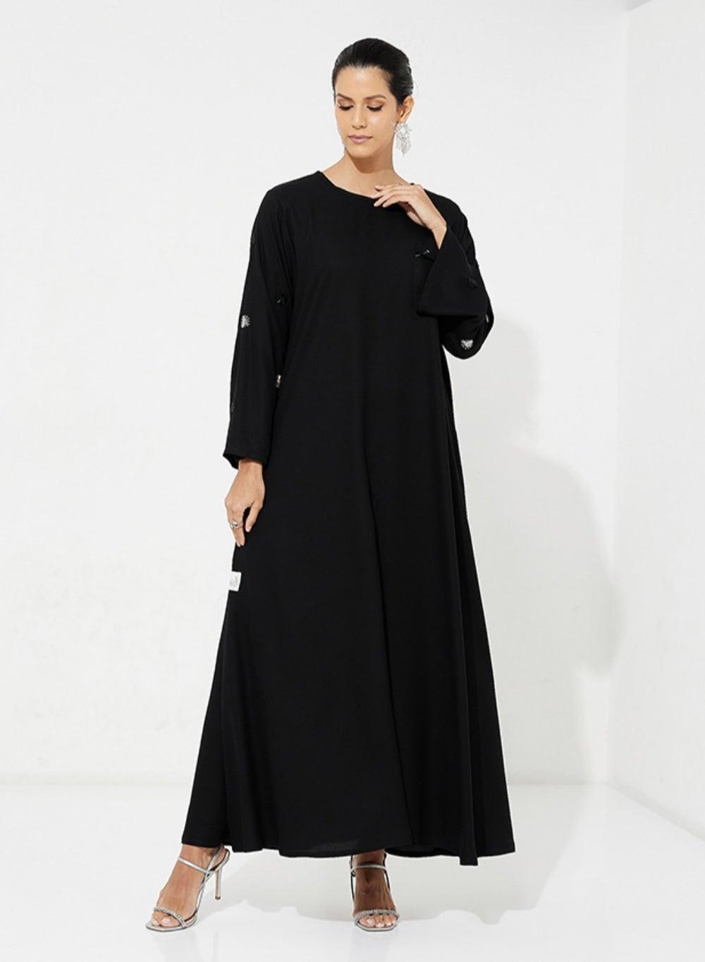 Wide Black Dress with Hand Embroidered Stone Detail - Image 1