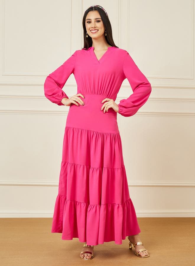 Tiered Long Sleeve Maxi Dress in Vibrant Pink - Image 1