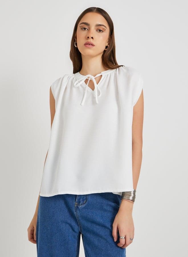 Sleeveless Tie-Up Neck Solid Blouse - Image 1