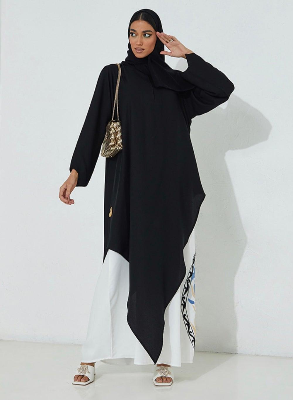 Black Abaya with White Dress and Blue Motifs - Image 1