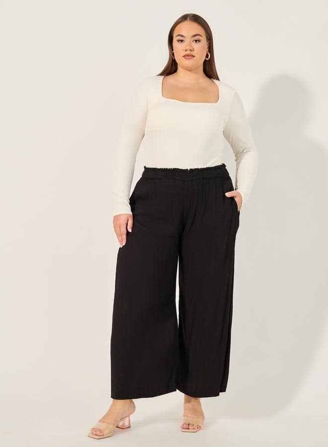 Styli Plus Size Crinkled Wide Leg Ankle Pants - Image 1
