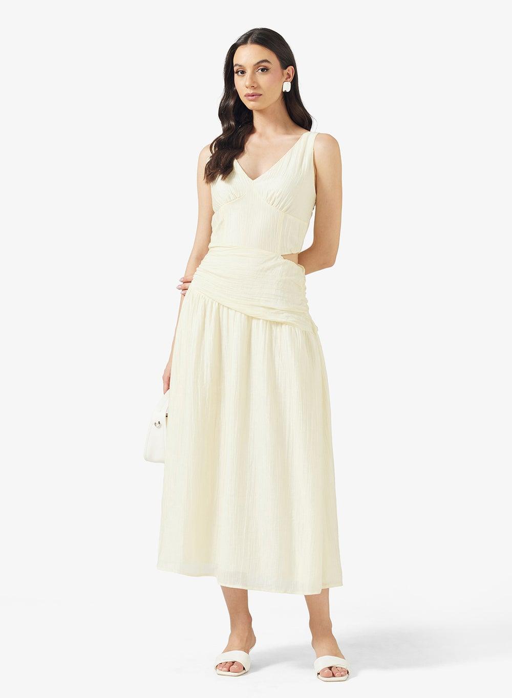 Sleeveless Dress With Asymmetric Waist Midi Style - Image 1