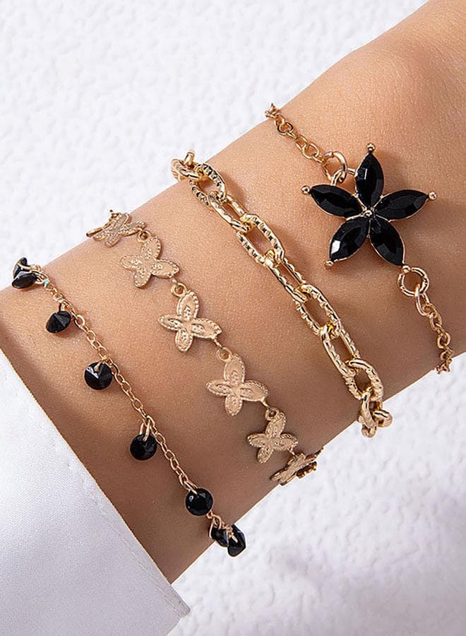 Styli Set of 4 Gold Tone Bracelets with Black Accents - Image 1