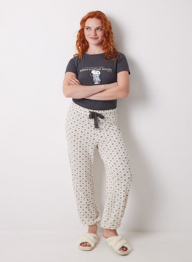 Long Carrot Trousers with Checkered Floral Print - Image 1