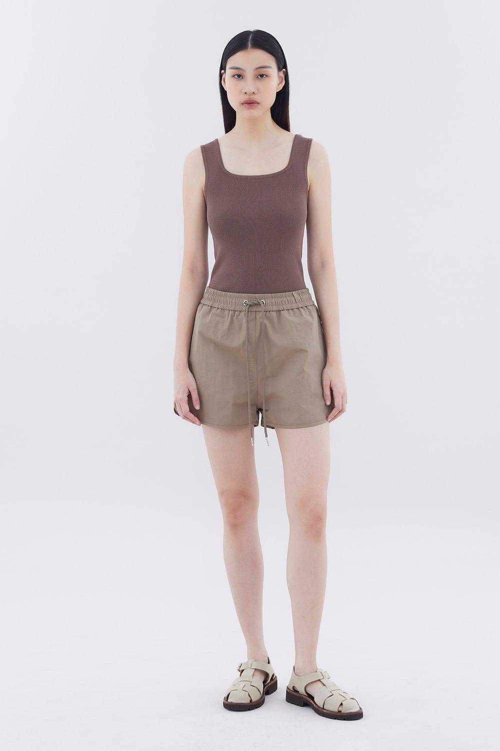 Ellegra Curve-Hem Nylon Shorts - Image 1