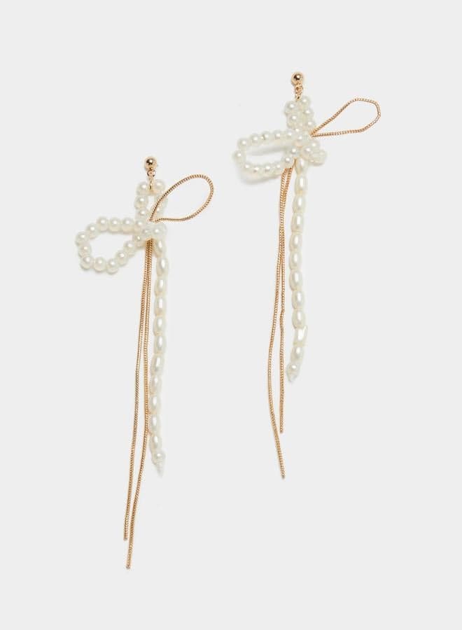 Styli Pearl Bow Gold Dangle Earrings - Image 1