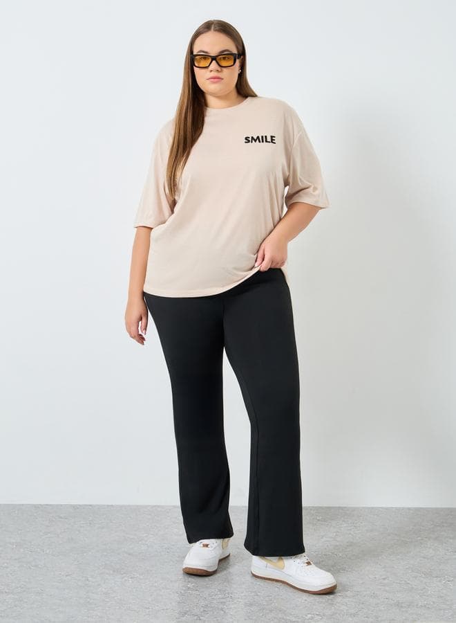 Women Plus Size Black Flared Leggings - Image 1