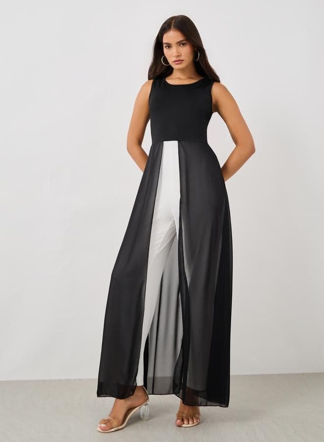 Sleeveless Color Block Jumpsuit with Chiffon Skirt Detail - Image 1