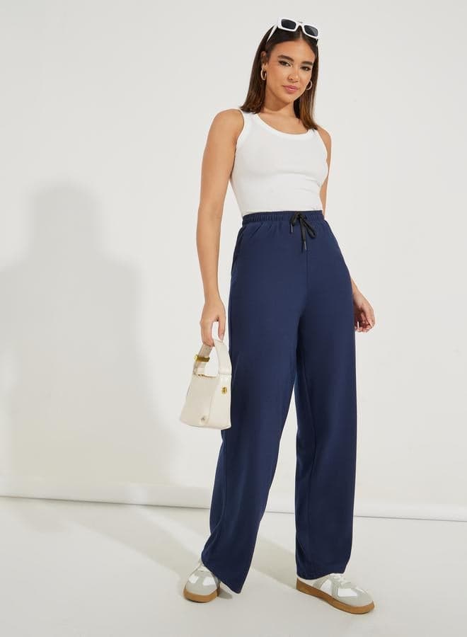 Styli Solid Wide Leg Joggers with Elasticated Waist - Image 1