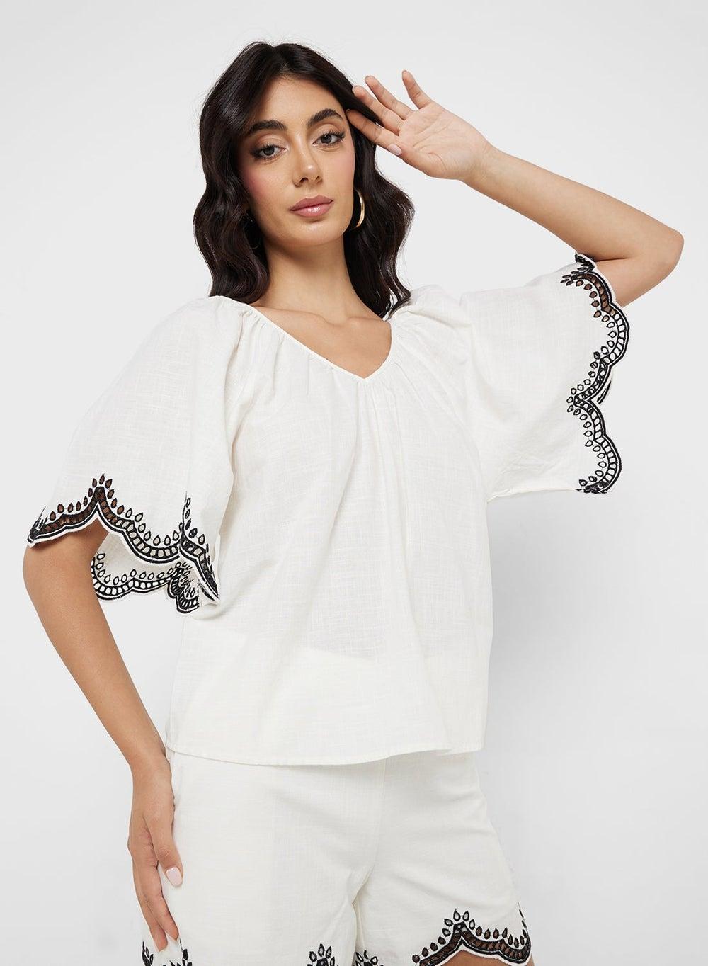 V-Neck Drawstring Embroidered Cotton Blouse - Image 1