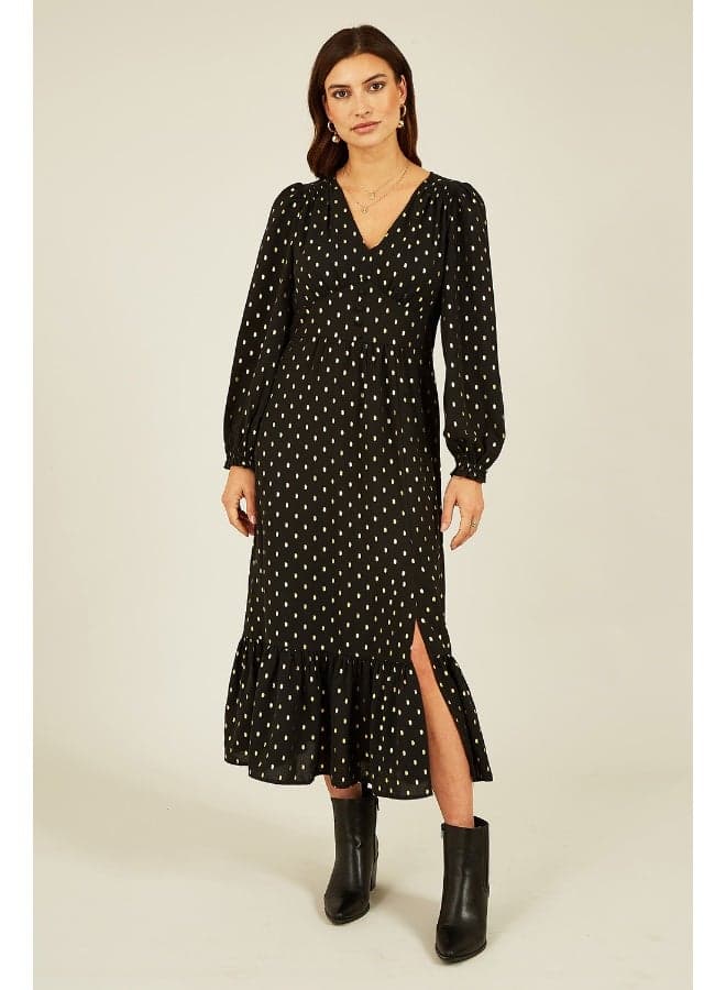 Black Polka Dot Midi Dress with Ruffled Hem - Image 1