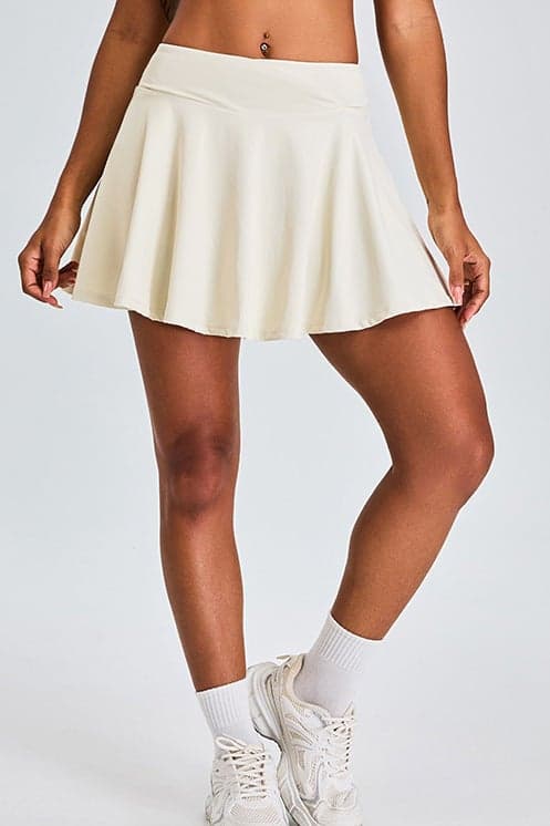 Featherlight Flow Padel Skirt with Built-In Shorts - Image 1